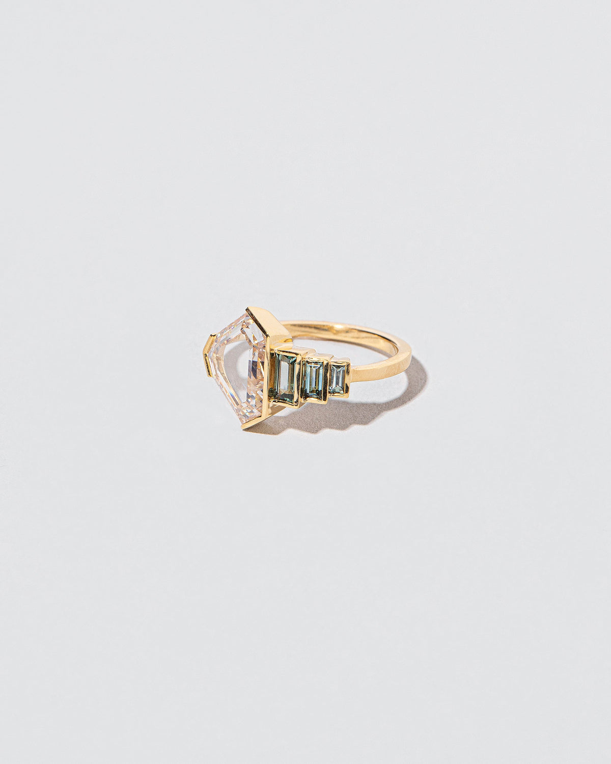  Transcendence Ring on light color background.