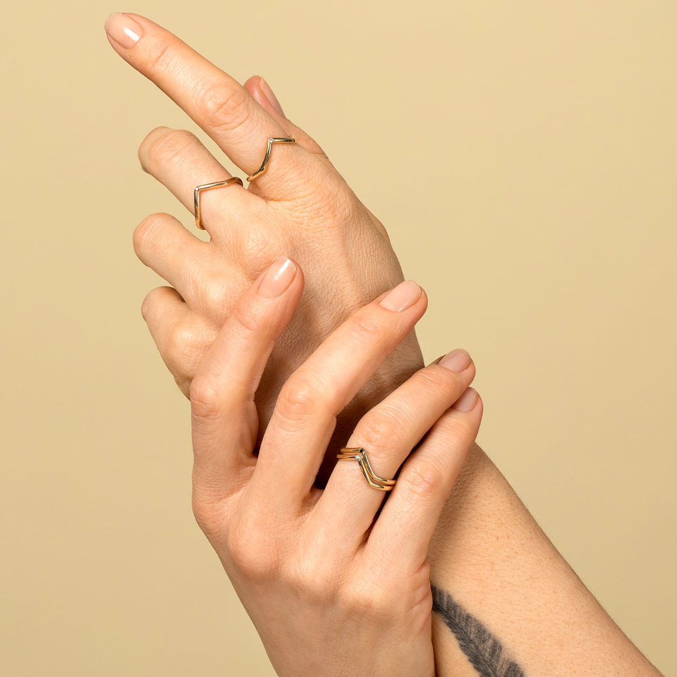 product_details::Gold Single Stone High Peak Bands on model.