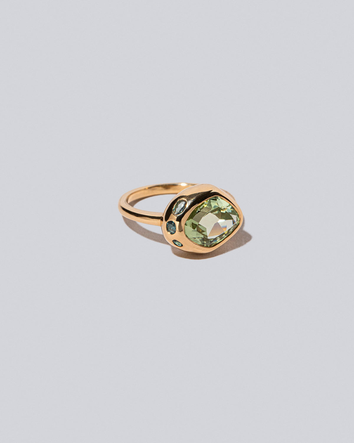 View from the side of the Yarrow Ring on light color background.