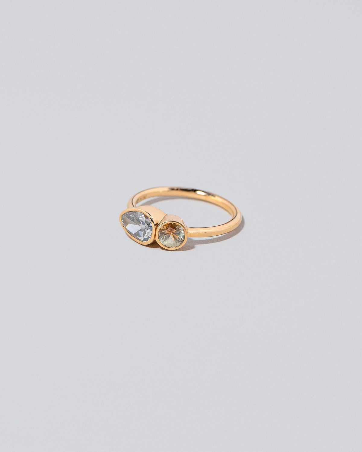  Assal Ring on light color background.