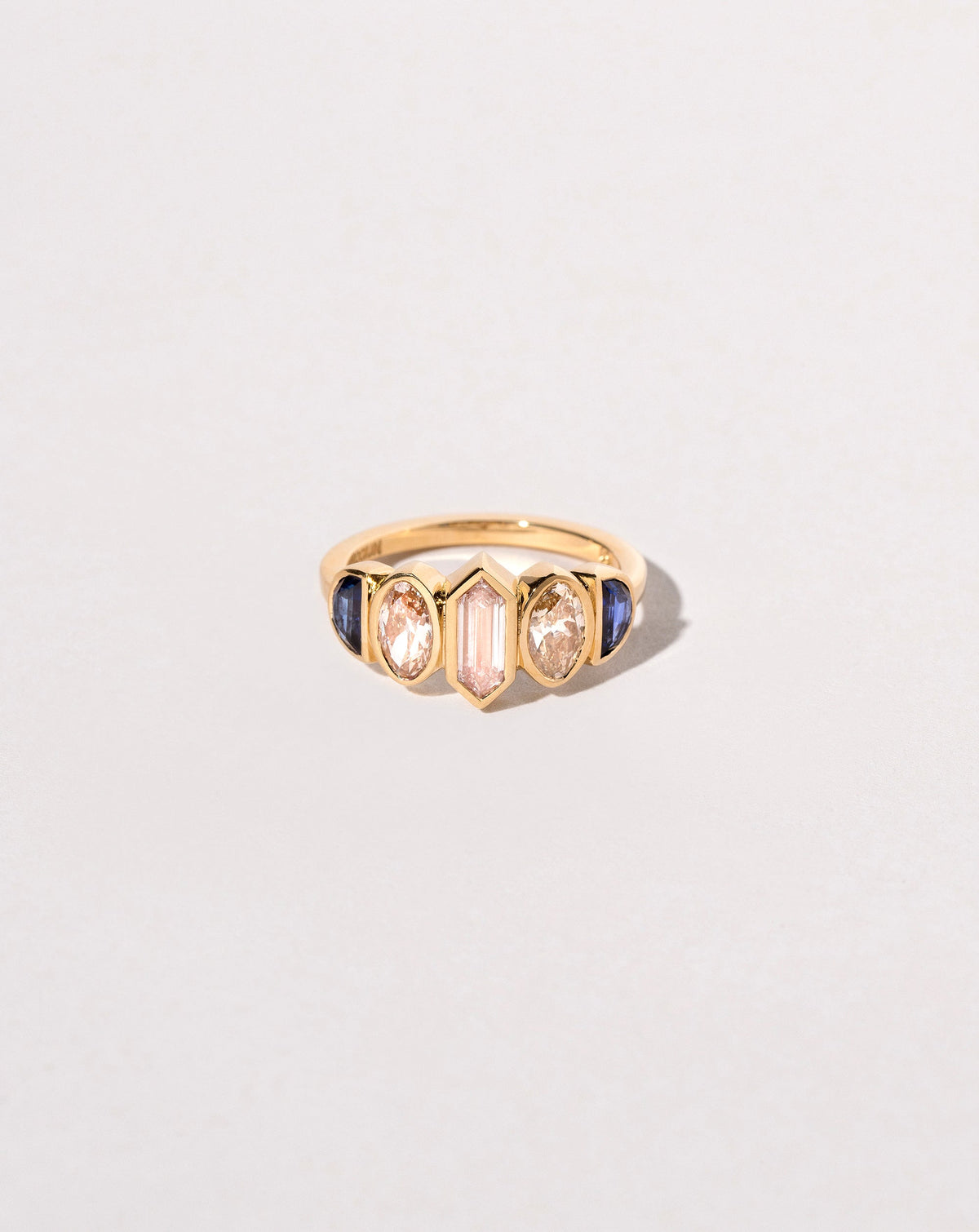  Larkspur Ring on light color background.