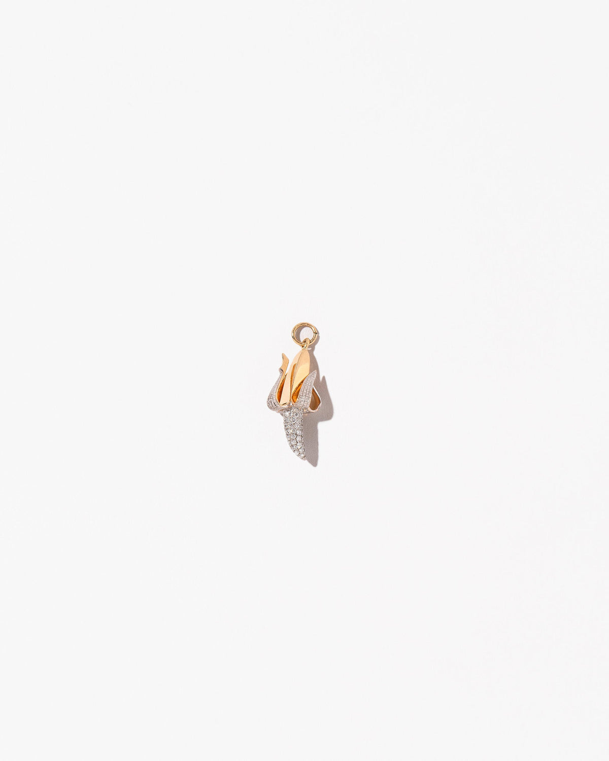 Peeled Banana Charm on light color background.