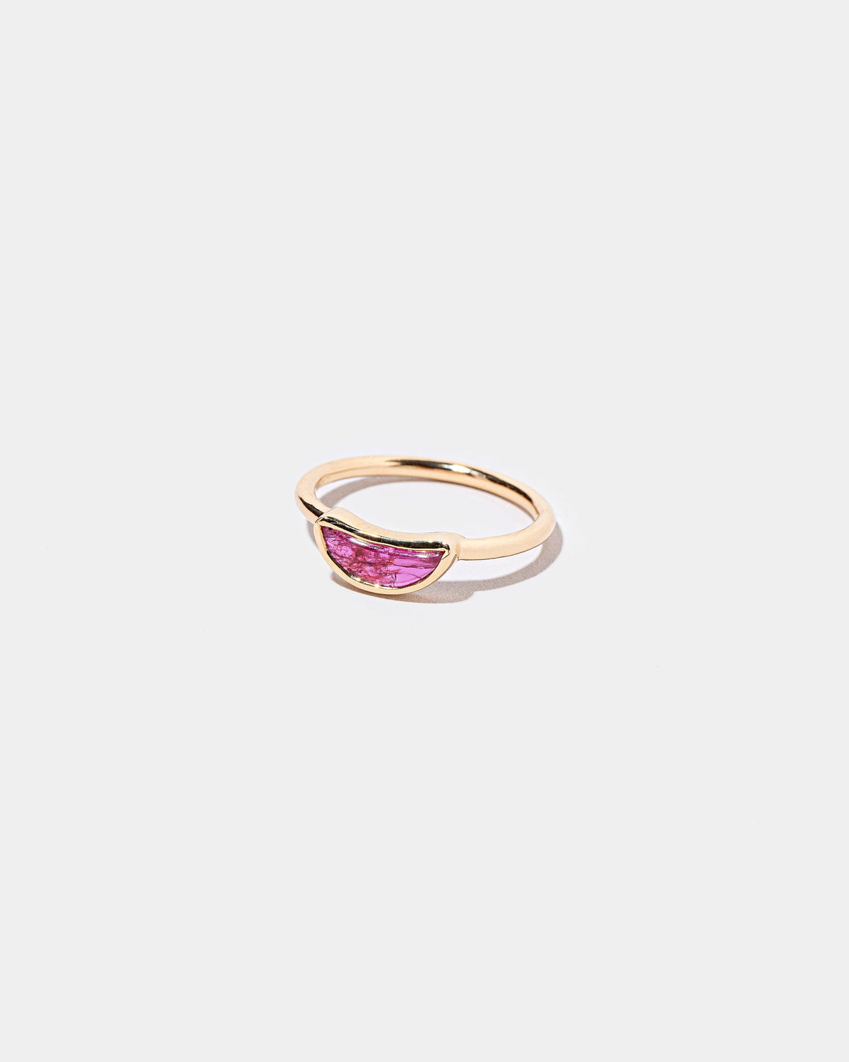 View from the side of the Passion Ring on light color background.