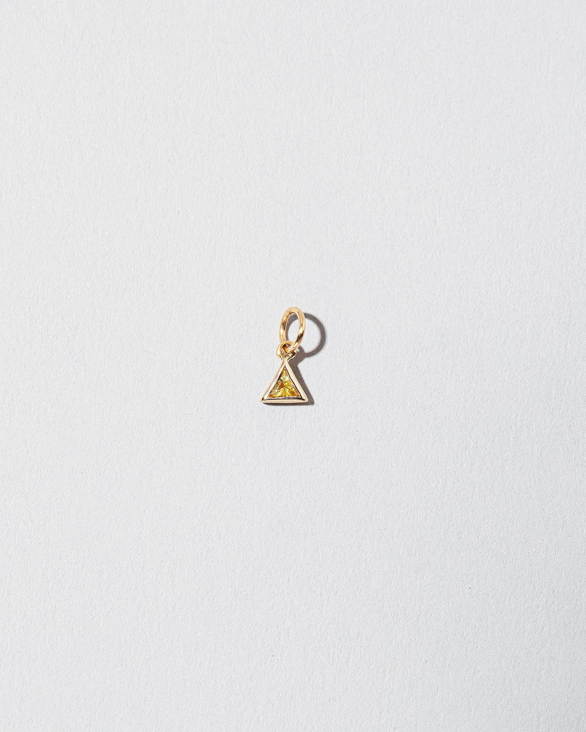  Sapphire Pendant on light color background.