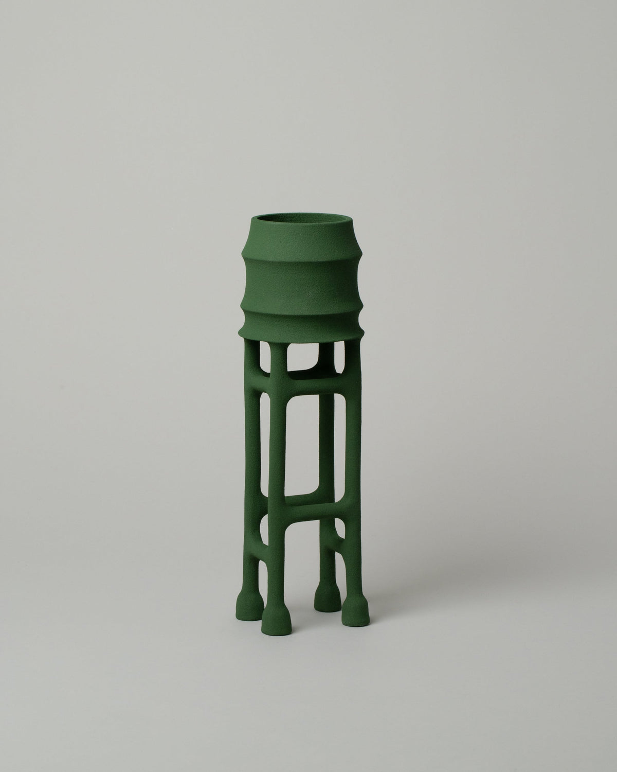  Solenne Belloir Forest Green Water Tower on light color background.