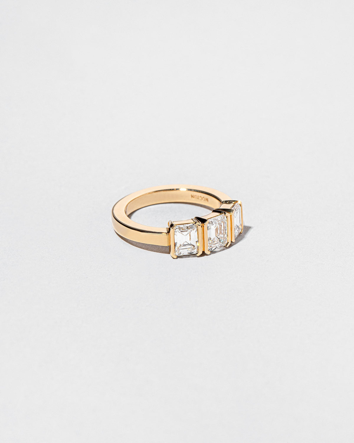  The Puritan 3 Ring on light color background.