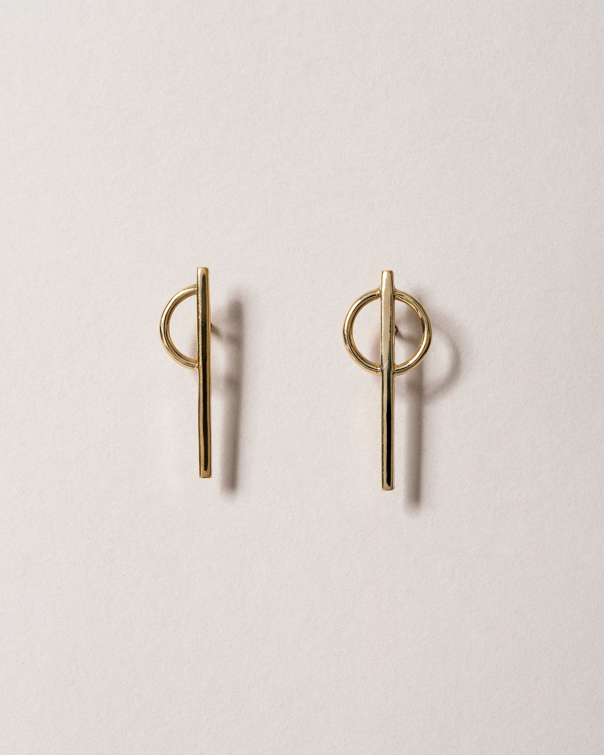  Stilt Dance Stud Earrings on light color background.