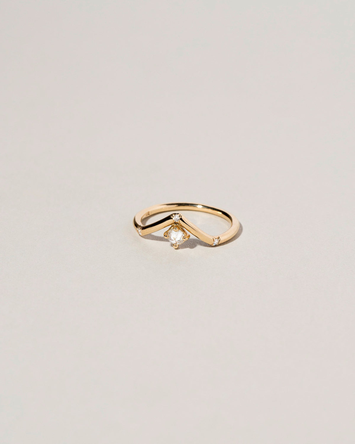  Mini Peak Ring on light color background.