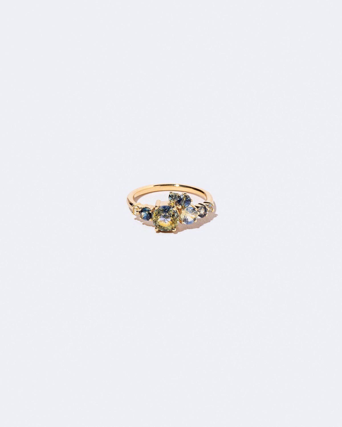  Luna Ring - Bicolor Sapphire on light color background.