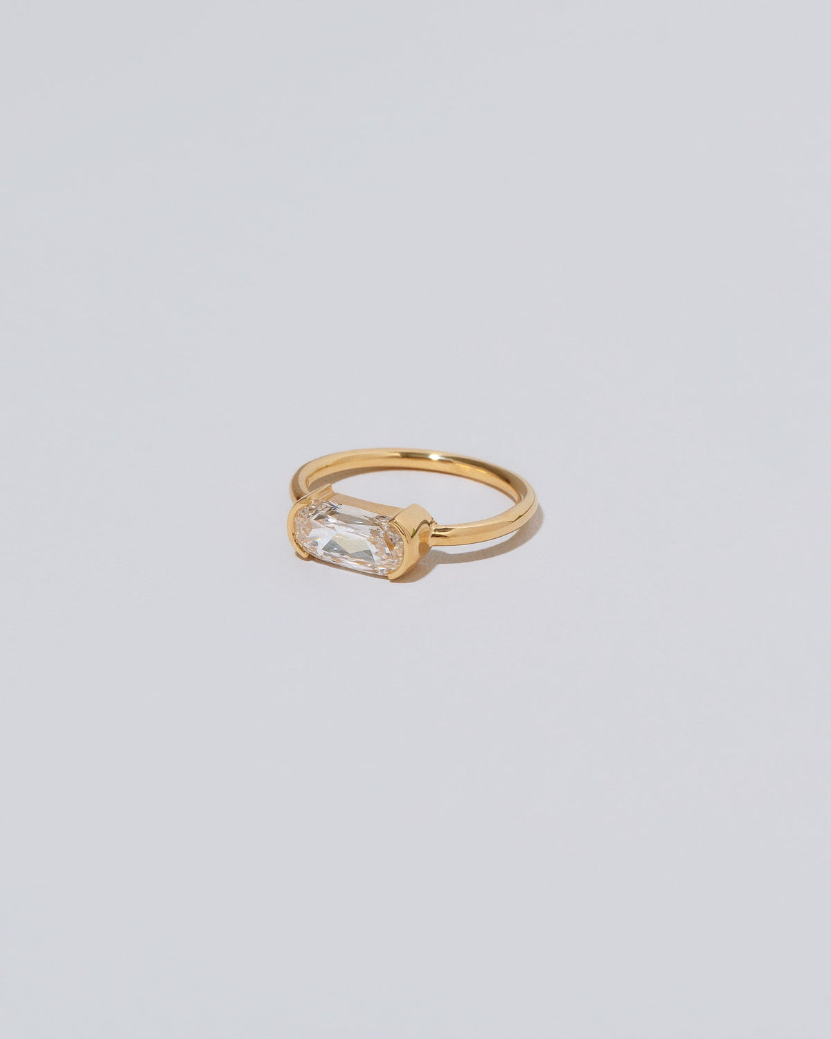 View from the side of the Passé Ring on light color background.