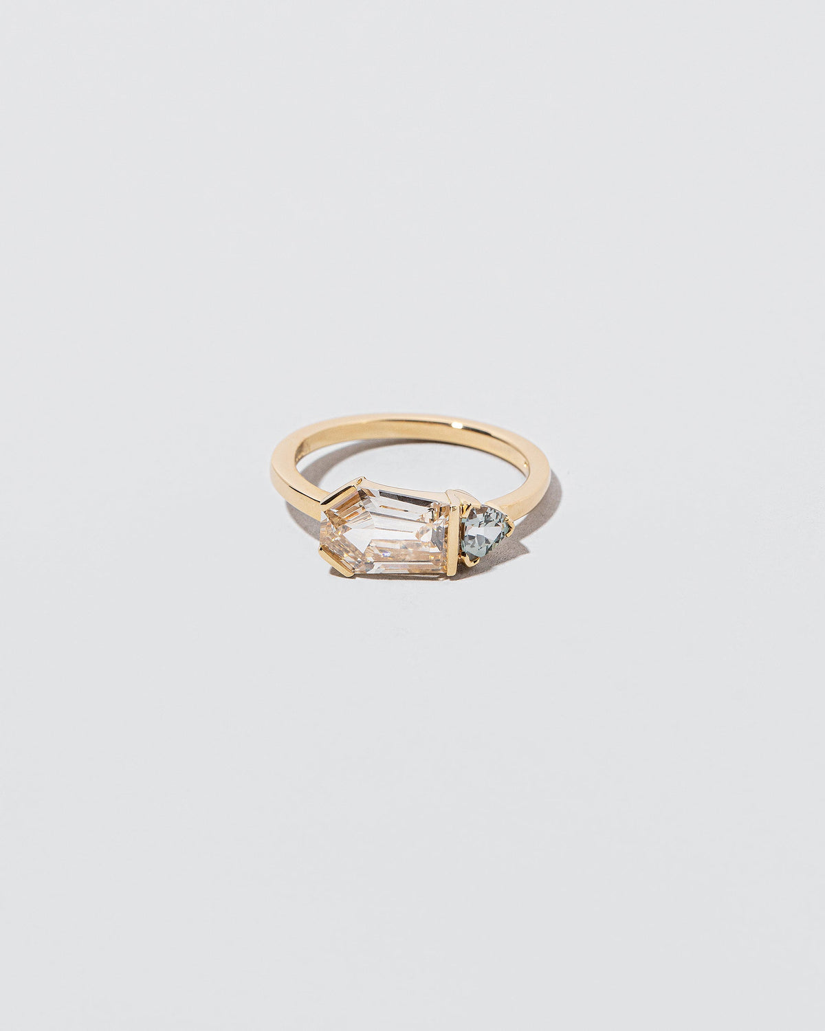  Pursuit Ring on light color background.