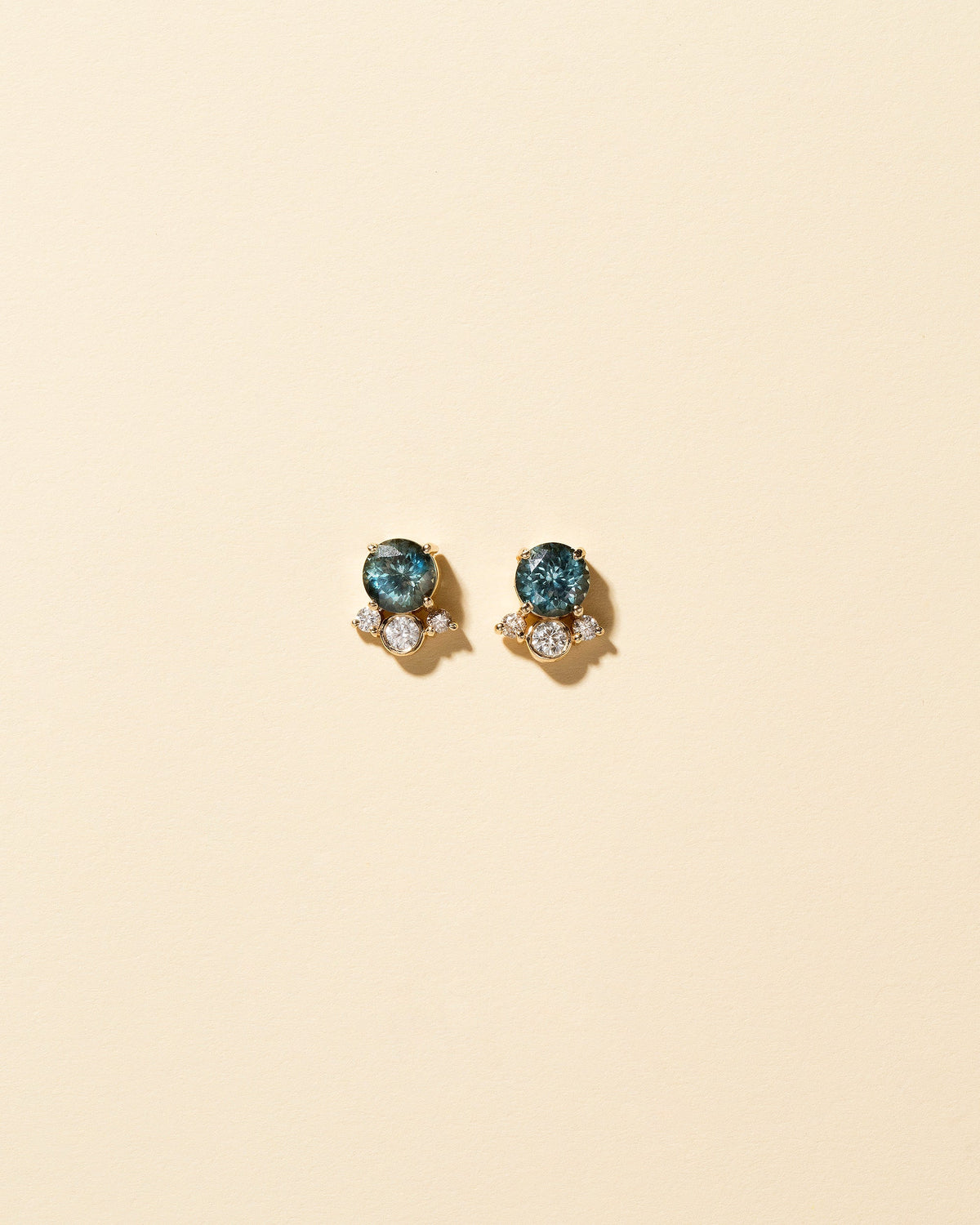  Vega Earrings - Blue Sapphire on light color background.