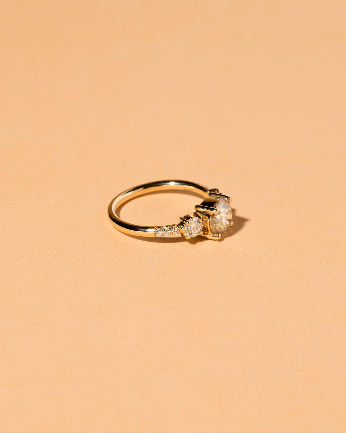  Rhea Ring on light color background.