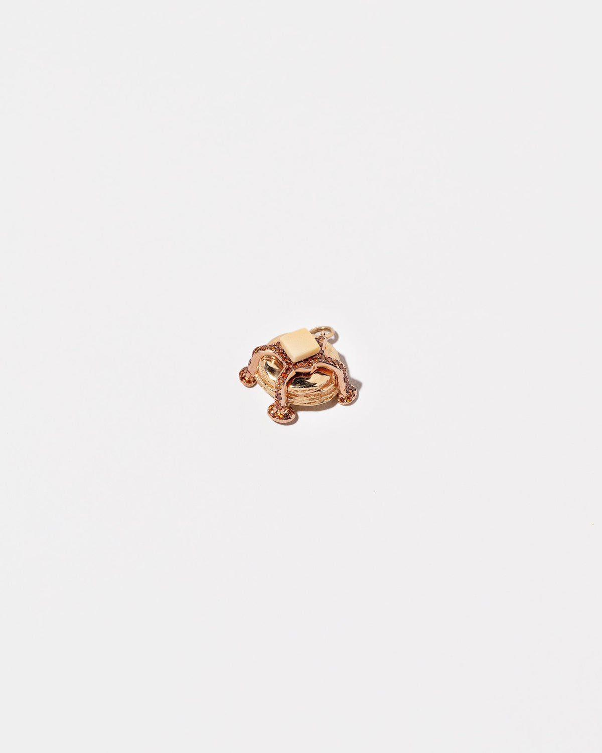 Closeup details of the Tall Stack Pancake Charm on light color background.