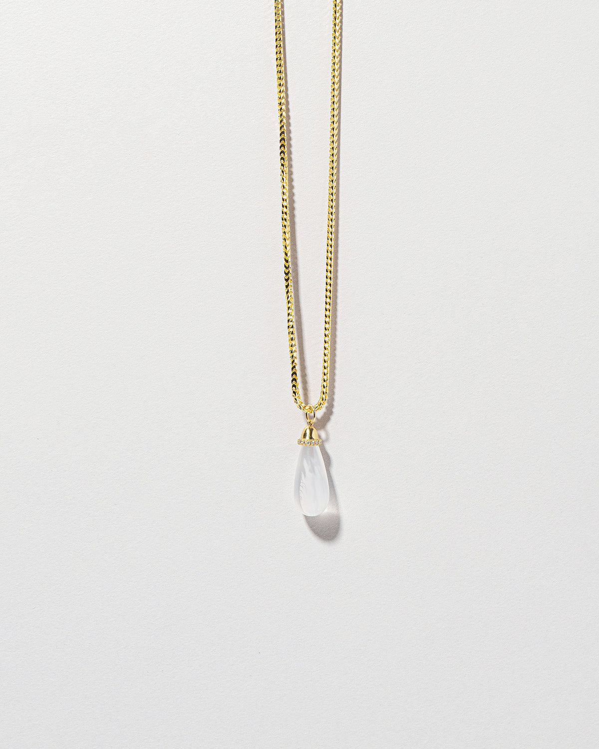  Moonstone Drop Pendant on light color background.