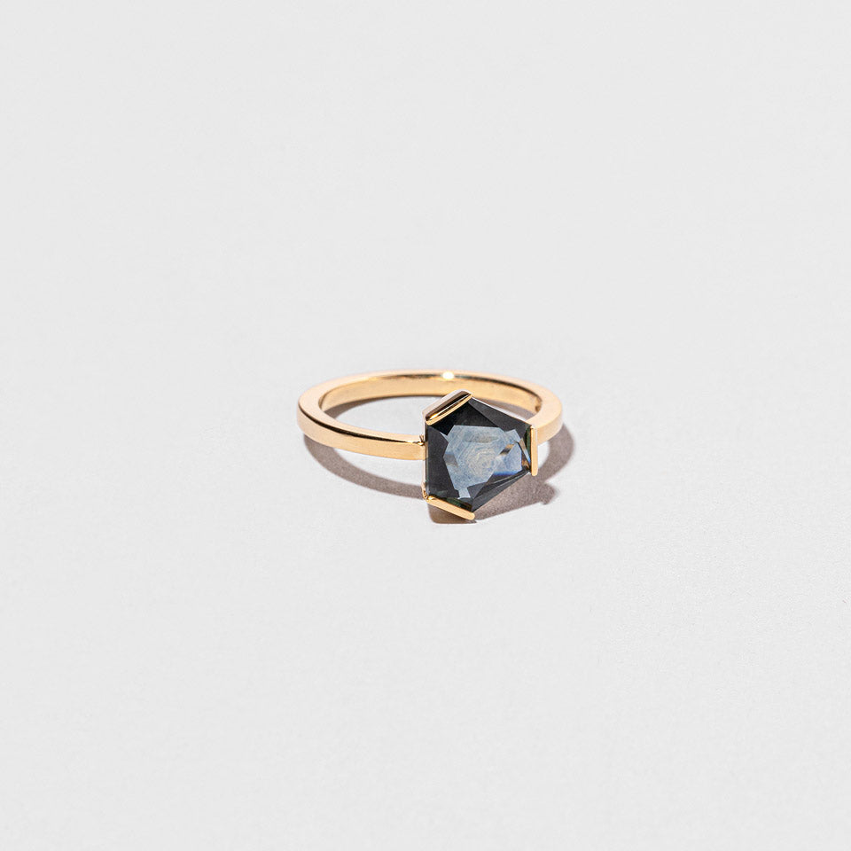 product_details::Closeup details of the Audrey II Ring on light color background.